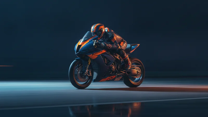 Navy and orange racing motorcycle cornering at high speed with motion blur for online casino sports betting.